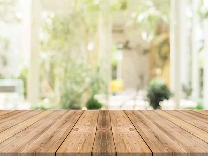Wooden board empty table in front of blurred background. Perspec میز چوبی